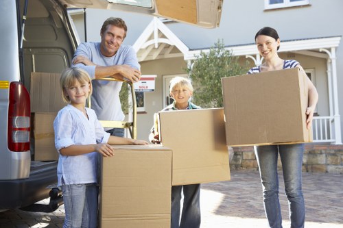 Skilled movers carefully handling delicate items
